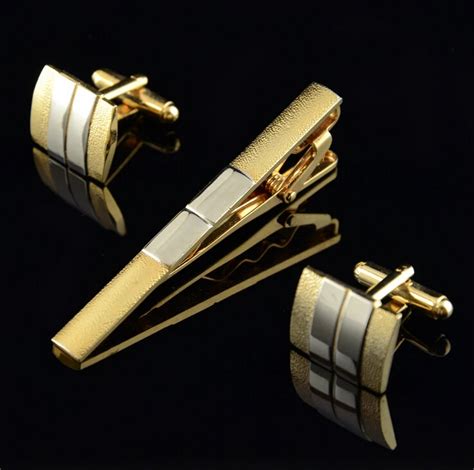 old cufflinks and tie clips.